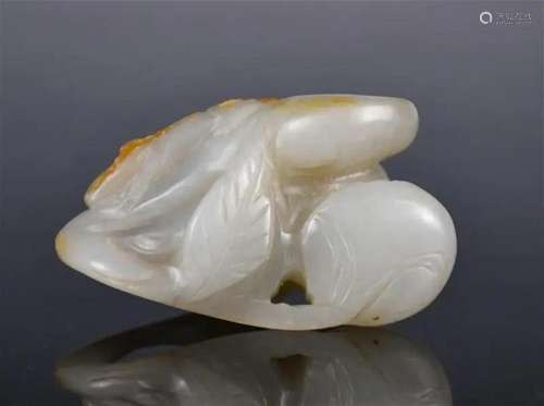 A Celadon Jade Carved Peaches & Rat Qing