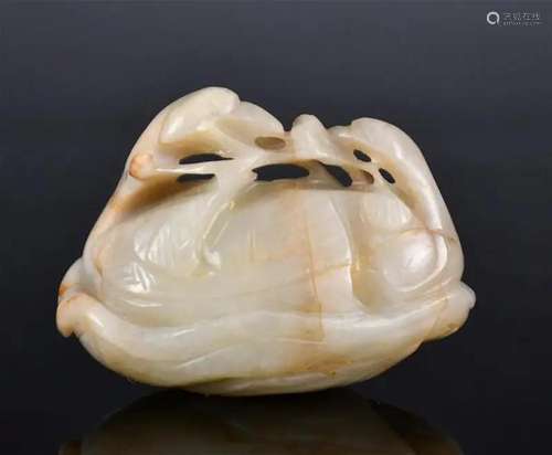 A Celadon Jade Carving of Birds & Lotus Qing