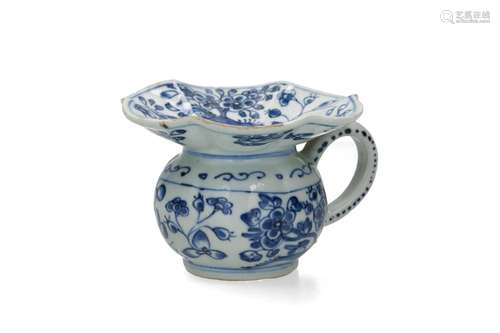 A blue and white porcelain cuspidor with lobed bell