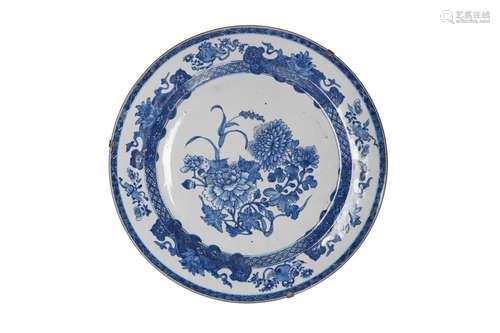 A blue and white porcelain charger, decorated with