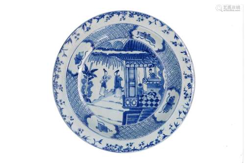 A blue and white porcelain charger, decorated with