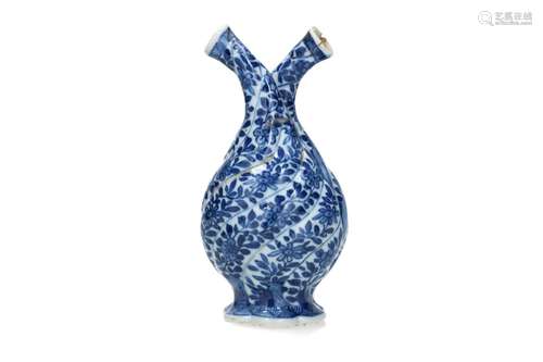 A blue and white lobed cruet bottle, decorated with