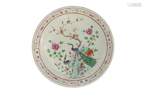 A polychrome porcelain charger, decorated with peac