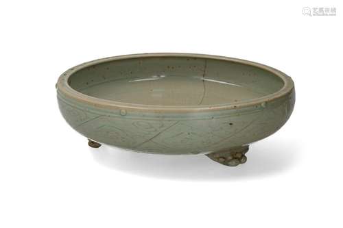 A celadon glazed tripod censer. Unmarked. China, Mi