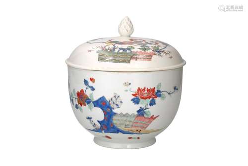 A kakiemon porcelain tureen, decorated with a peaco