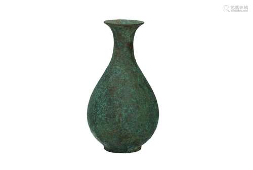 A bronze vase. Unmarked. China, Han or later.<br />
H. 2