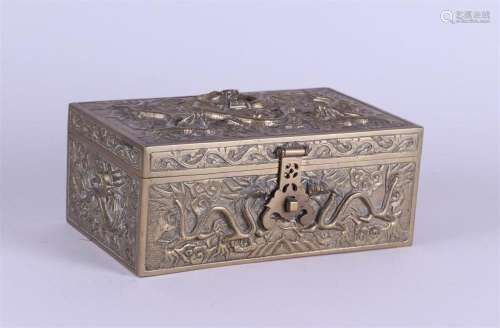 A lidded brass box decorated with dragons. China, 20th centu...