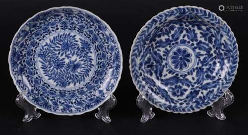 Two porcelain plates, both with floral decor, and marked on ...