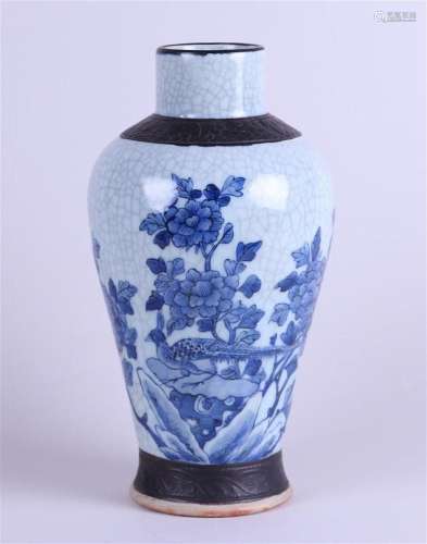 A Nakning pottery vase decorated with pheasant and flowers. ...