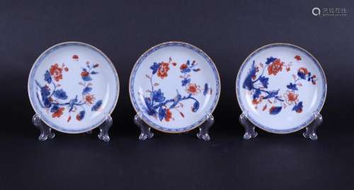 Three porcelain Imari plates with a decoration of a bird on ...