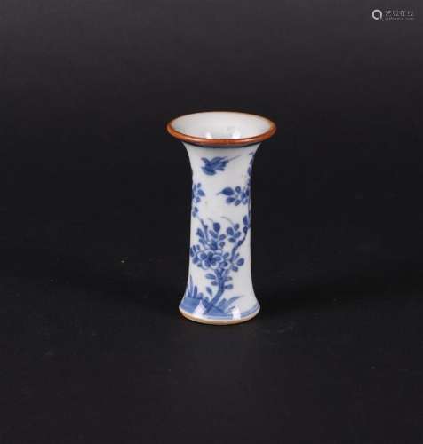 A porcelain cup vase with rich floral decoration, with birds...