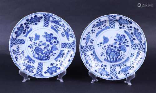 A set of two ribbed dishes with a floral design in  compartm...