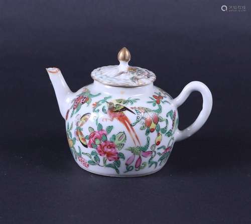 A porcelain Kanton teapot decorated with birds, butterflies ...