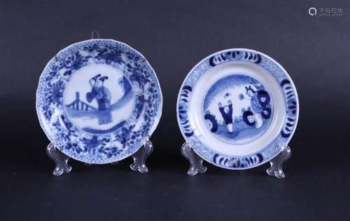 Two porcelain plates with frostings and  playing boys  decor...