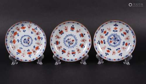 Three porcelain Imari plates with floral decoration. China, ...