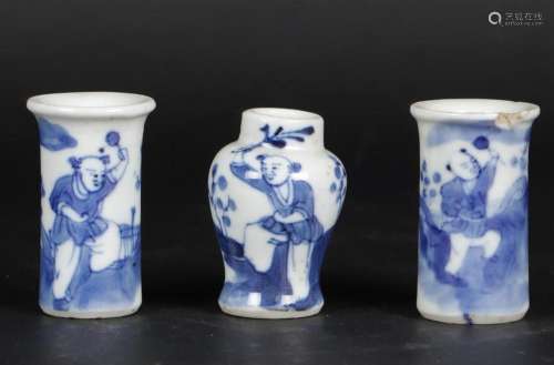 A porcelain miniature  cupboard set vases  decorated with fo...