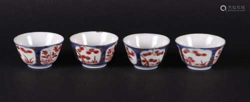 Four porcelain Imari bowls with floral decor in compartments...