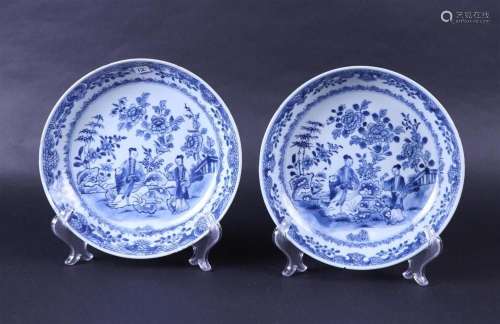 A set of two porcelain deep dishes decorated with court ladi...