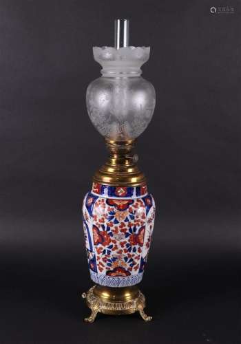 And a porcelain Imari vase converted into an oil lamp. Japan...