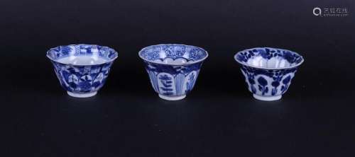 Three porcelain bowls with floral decor in borders,
