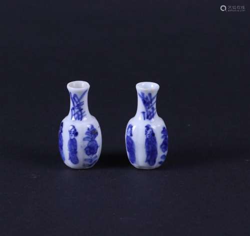 A set of two porcelain miniature vases decorated with Long E...