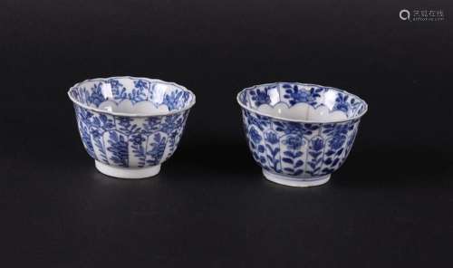 Two contoured and ribbed porcelain bowls, both with floral d...