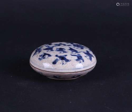 A soft paste lidded box decorated with fools, marked underne...