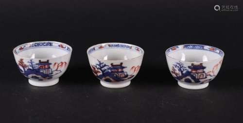 Three porcelain Imari bowls with river landscape decor  and ...