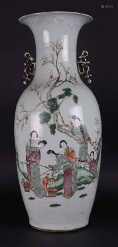 A porcelain Famille Rose vase decorated with various figures...
