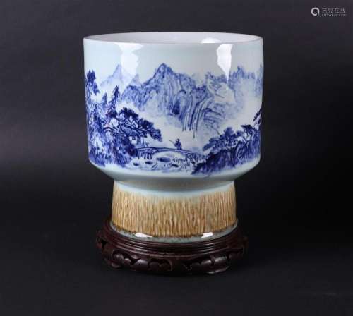 A porcelain Jingdezhen beaker vase with landscape decor. Chi...
