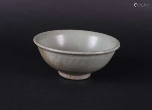 An unprocessed green/grey Celadon bowl. China Early Ming, pe...