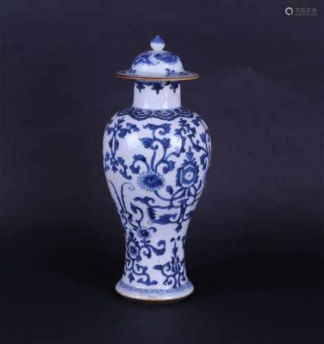 A porcelain lidded vase with stylized floral decoration, wit...