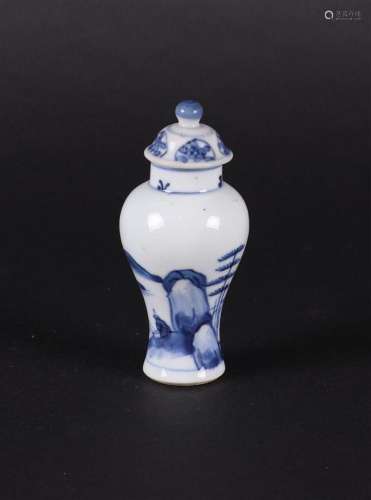 A porcelain baluster-shaped lidded vase with a continuous ri...