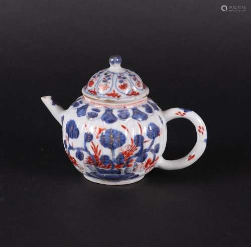 A porcelain Imari teapot ribbed model with floral decor. Chi...