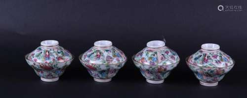 A lot  with (4)  porcelain Canton lidded cups and saucers wi...
