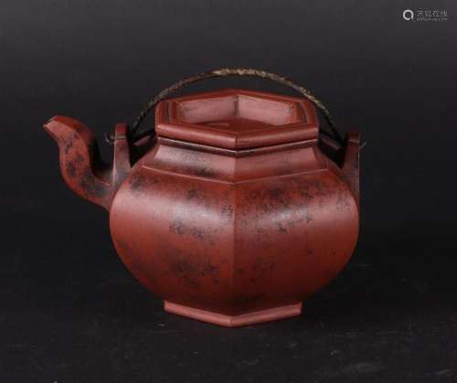 A Yixing teapot, marked on the lid. China, 20th century.