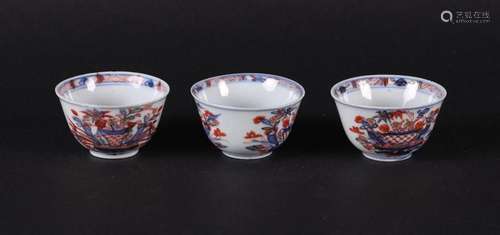 Three porcelain Imari bowls with rich basket decoration on t...