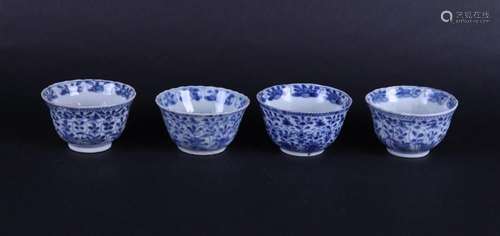 Four contoured porcelain bowls with floral decoration in flo...