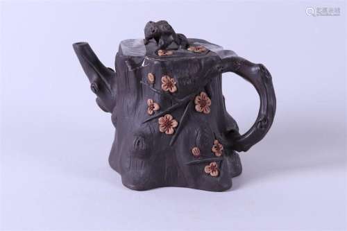 A Yixing teapot in the shape of a tree trunk. China, 20th ce...