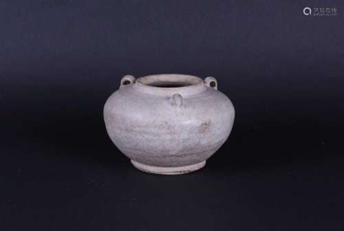 A stoneware storage jar with three looped ears. China, early...