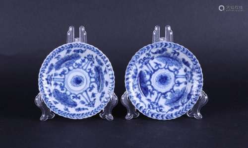 Two ribbed dishes with lotus flower decor, marked on the bac...