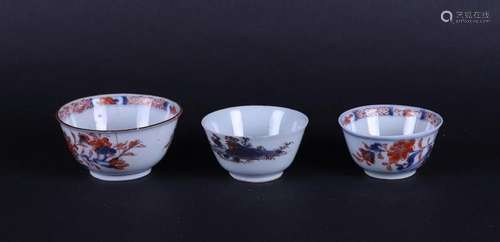 Three various Imari bowls with floral decor and landscape de...