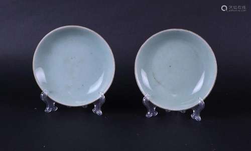 Two Celadon dishes with seal mark on the bottom. China, Ming...