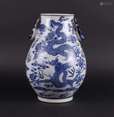 A porcelain 'Hu' vase decorated with dragons and deer heads,...