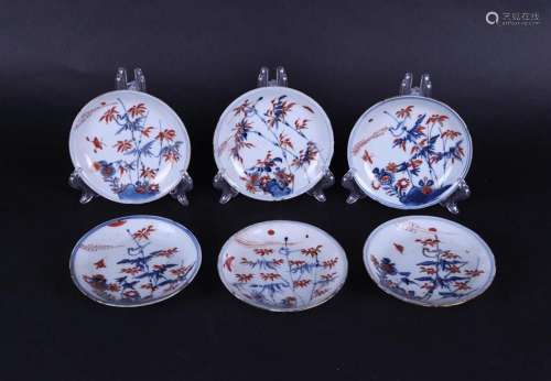 Six porcelain Imari plates with bird on bamboo branch and bu...