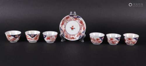 Six porcelain Imari bowls and one plate with a bamboo raft d...