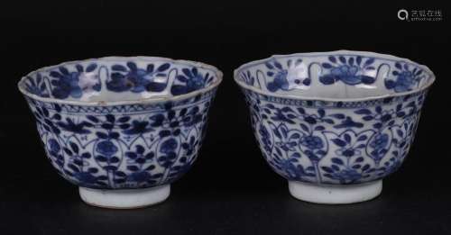 Two porcelain cups with tulip-shaped outer beds  and floral ...