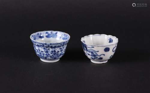 Two various contoured porcelain bowls, both with floral deco...