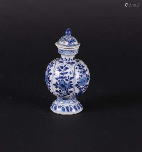 A porcelain used vase on a constricted foot with 6-leaf bord...