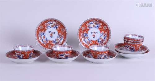 A set of (5) porcelain Imari cups and saucers with landscape...